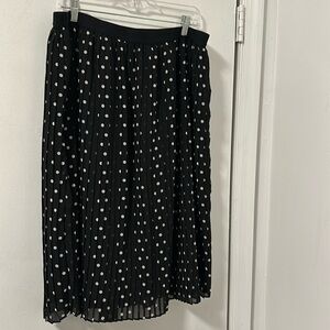 A new day, women polka dot skirt. Pleated. Was never worn. With loose waist.